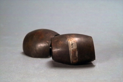 Brass plates of constant positive curvature