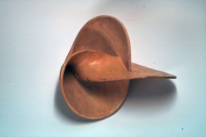 Two-sided surface with the clover leaf sling as boundary curve