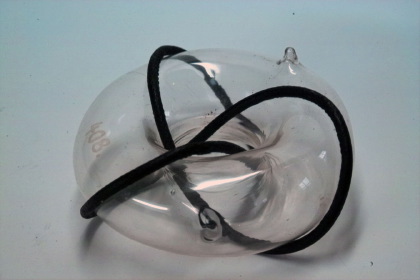 Clover leaf sling on torus