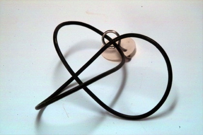Clover leaf sling on torus