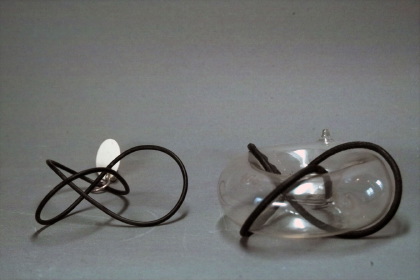 Clover leaf sling on torus